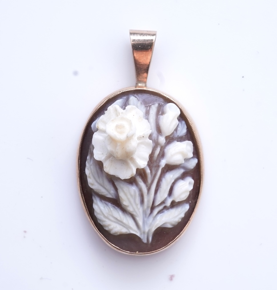 Eight pairs of earrings and pendant, comprising: a pair of onyx studs; a pair of emerald studs; a pair of sapphire and diamond drop earrings; a pair of opal drop earrings; a pair of garnet drop earrings; and a shell pend